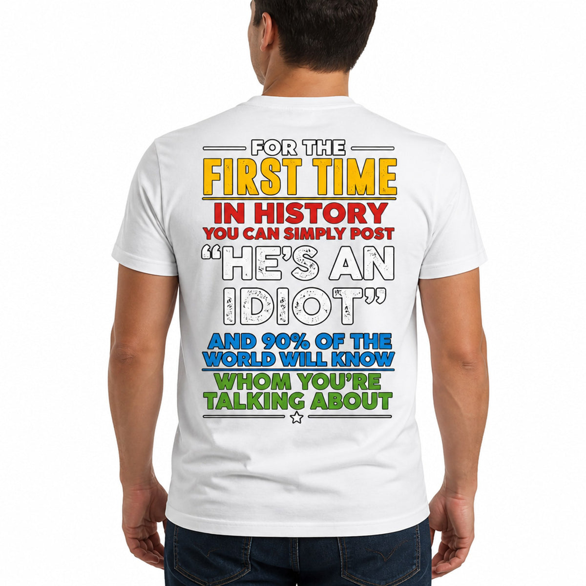 Plain t-shirt with bold typographic text reading "He's an idiot" centered on the chest