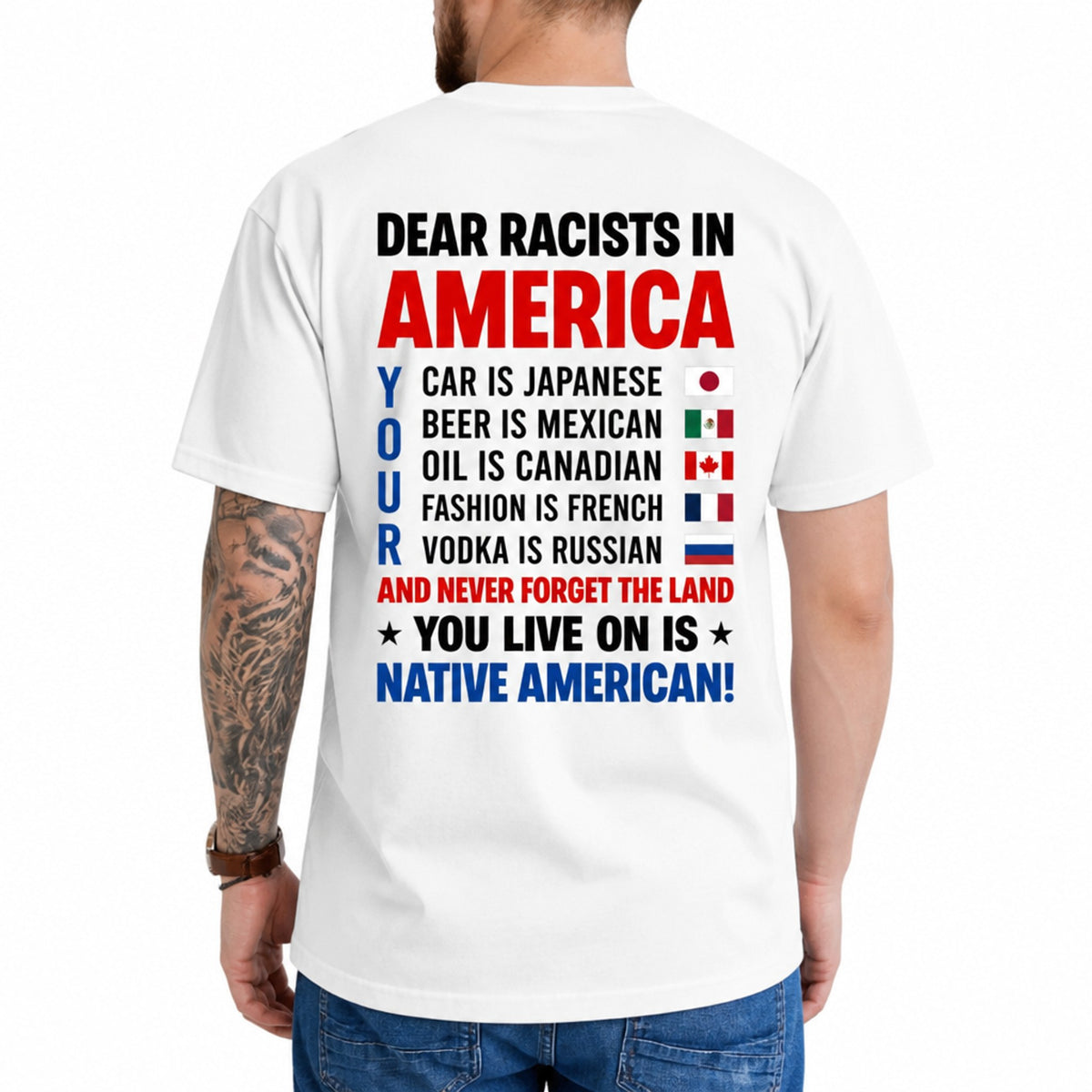 T-shirt reading 'RACISM IS NOT PATRIOTISM' with stylized flag graphics in bold typography