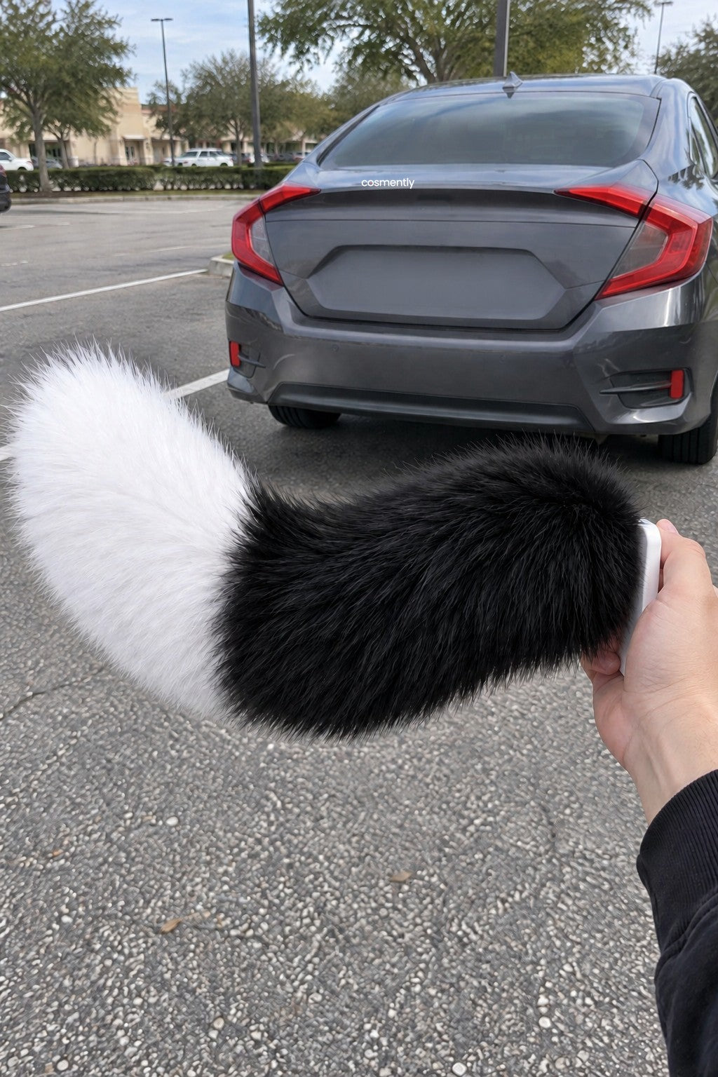 Hand holding the simple line-of-sight remote